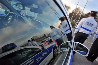 آتش زدن مامور پلیس توسط یک راننده! +عکس