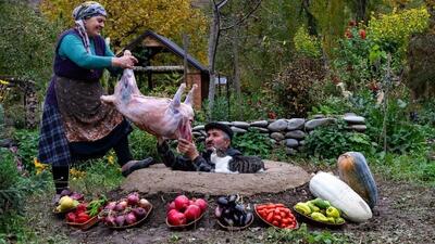 آشپزی روستایی در دل طبیعت: کباب بره کامل در تنور زیرزمینی (فیلم)