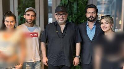 توضیحات رضا رشیدپور درباره عکس با عوامل عشق ابدی