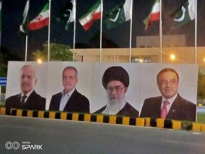 تصاویر رهبر انقلاب و «پزشکیان» در پایتخت این کشور