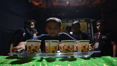 تصاویری از عشق و دلدادگی خالصانه کودکان و نوجوانان روستای ده محمد در موکب حضرت رقیه «س» + فیلم