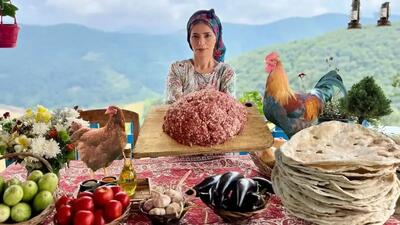طرز تهیه کوفته خوشمزه همراه با نان تافتون در تنور (فیلم)