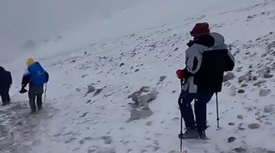 تصاویر بارش برف در قله دماوند در میانه تابستان