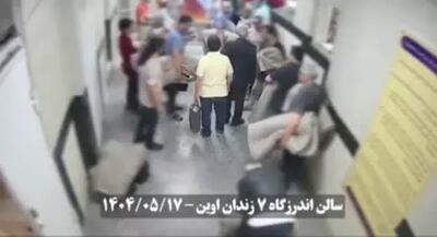 فیلم لحظه ورود تعدادی از زندانیان امنیتی به سالن اندرزگاه شماره ۷ زندان اوین