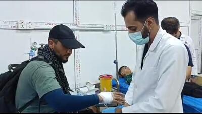 خدمت‌رسانی شبانه‌روزی جهادگران سلامت شیراز به زائران اربعین در کربلا و نجف +فیلم