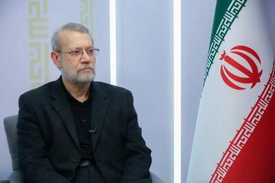 لاریجانی در حلقه محافظان عراقی در بین‌ الحرمین (عکس)