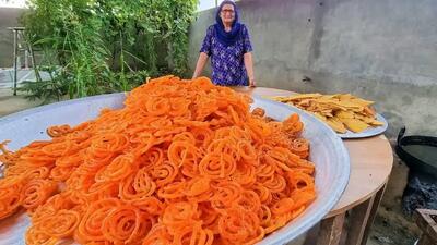 طرز تهیه فافدای سنتی هندوستان توسط مادربزرگی روستایی (فیلم)
