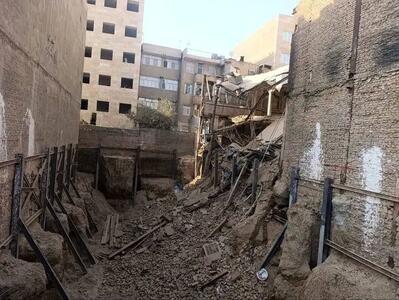 ریزش ساختمان در ولیعصر تهران/ کارگران جان سالم به در بردند