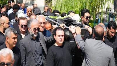 قابی به یادماندنی از وداع مردم بابل با مهرداد فلاحتگر