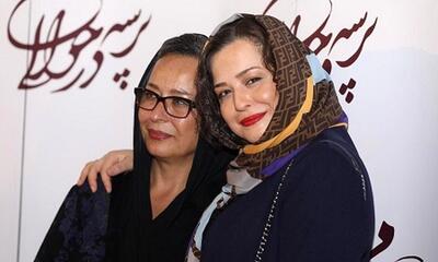 عکس زیرخاکی از کودکی مهراوه شریفی‌نیا در کنار مادرش