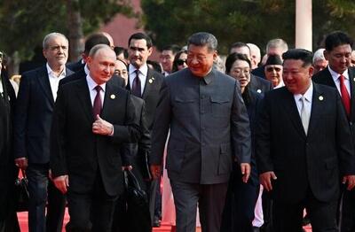 کیم و پوتین روی فرش قرمز میدان «تیان‌آن‌من» چین - اکونیوز