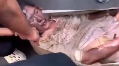 جسد همسر نخست وزیر نپال پس از سوزاندن +18