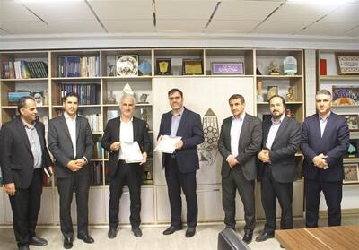 تفاهم‌نامه شهرداری همدان و بنیاد تعاون بسیج برای توسعه شهرک‌های مسکونی و تجاری - تسنیم