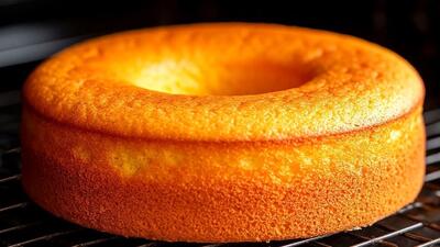 طرز تهیه کیک پرتقالی با بافت اسفنجی ساده و خوشمزه (فیلم)