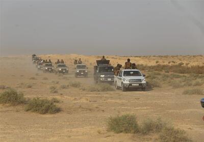 رزمایش حشد الشعبی در نزدیک مرز با سوریه - تسنیم
