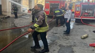 خاموش شدن آتش در بازارچه ساحلی کیانپارس اهواز