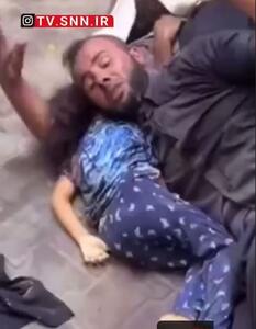 تصاویر دردناک پدری فلسطینی که پیکر دختر خردسال شهید خود را در آغوش گرفته است