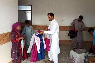 ۳۲۵ دانش‌آموز دلگانی صاحب کفش و لباس نو شدند