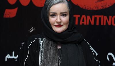 چهره ها/ قابی از نعیمه نظام‌دوست و رضا نیکخواه در یک مراسم