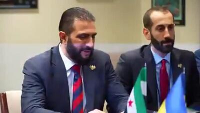 زلنسکی و الجولانی یکدیگر را در آغوش گرفتند + فیلم