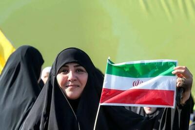 اهتزاز پرچم ایران در مراسم سالگرد شهادت سید حسن نصرالله/تصاویر