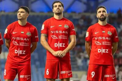 عکس| عزت‌اللهی روی پوستر شباب الاهلی برای بازی بزرگ
