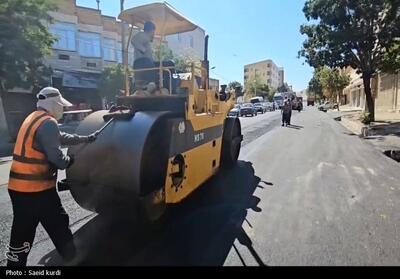 آسفالت معابر شهری بیجار؛ نهضت خدمت‌رسانی به مردم+فیلم - تسنیم