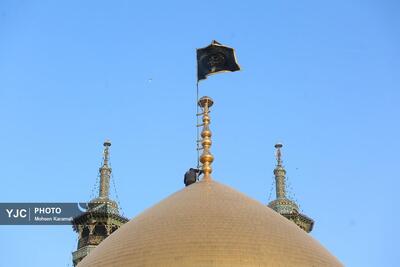 مراسم آیین تعویض پرچم گنبد حرم مطهر حضرت معصومه (س)