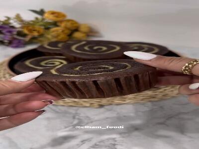 کیک شکلاتی کرمدار طعم شیرین زندگی