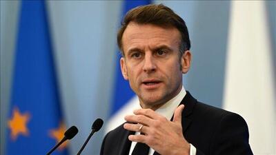 دست دادن متفاوت ترامپ و مکرون با یکدیگر
