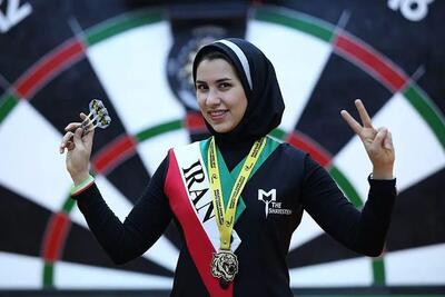  دختر قهرمان دارت جهان: از پلیس فرودگاه پرچم ایران گرفتم (فیلم)