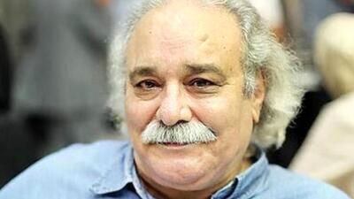 هدیه پرچم امام حسین به مزار محمد کاسبی