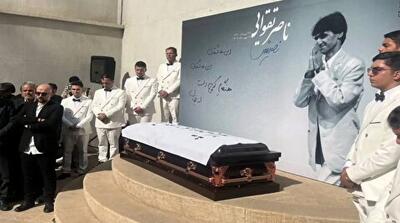 هلهله و دمام زنی در مراسم تشییع ناصر تقوایی | پیکر کارگردان نامدار در امامزاده طاهر آرام گرفت