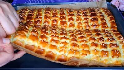  این طرز تهیه خوشمزه ترین نان یا پای پنیری است !