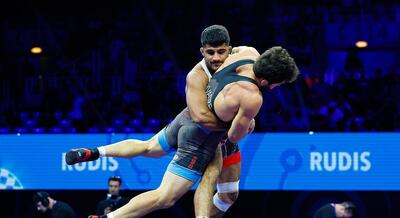  تصاویر شگفت انگیز اتحادیه جهانی کشتی از هنرنمایی غلامرضا فرخی+ فیلم