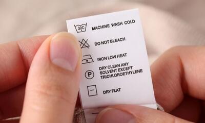  علائم روی لباس؛ معنای نمادها و علائم مهم برای مراقبت بهتر از لباس‌ها