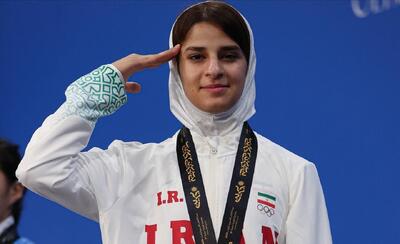  اولین طلای MMA توسط تیام ده پهلوان به دست آمد / احترام نظامی تیام ده‌پهلوان به پرچم ایران + فیلم و عکس