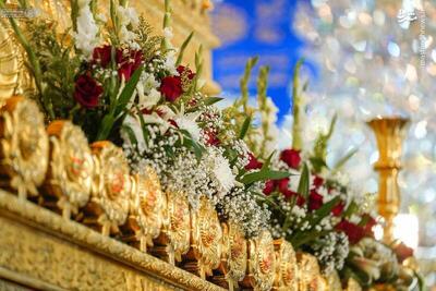  گل‌آرایی ضریح امیرالمومنین(ع) به‌مناسبت ولادت حضرت زینب(س)
