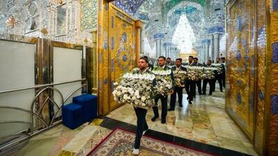  فیلم/ گل‌آرایی ضریح امیرالمومنین(ع) به‌ مناسبت ولادت حضرت زینب(س)
