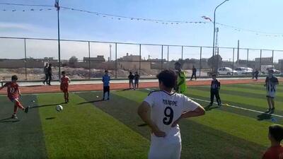  ابراز خرسندی ورزش دوستان روستای خان آباد کبودرآهنگ از احداث زمین چمن مصنوعی