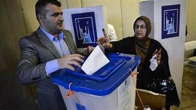  تصویر شوهر به جای کاندیدای زن در تبلیغات انتخابات عراق