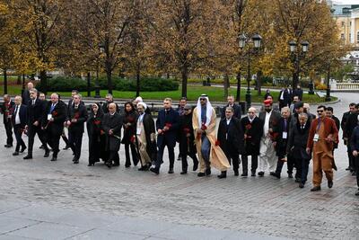 تصاویر ادای احترام هیات پارلمانی ایران به قربانیان جنگ در روسیه