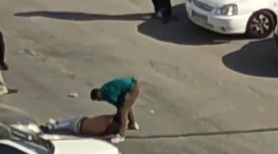  تصاویر زمین گیر کردن اوباش با تیراندازی