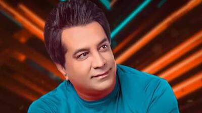  زمان عکس گردی| شوخی جالب مرحوم امید جهان با عکسش در دوران سربازی
