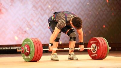  کوچ قهرمان وزنه‌برداری به بحرین! + عکس