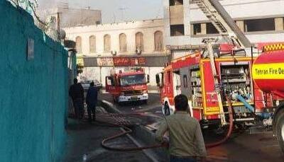  آتش‌سوزی کارگاه شارژ سیلندر گاز مایع در تهران؛ مصدومیت ۲ نفر و یک آتش‌نشان