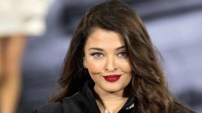  تاریخ وبگردی | تصویری از آیشواریا رای به همراه استیون سودربرگ در فستیوال فیلم کن