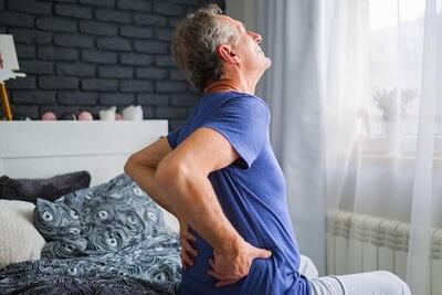  نشستن نادرست از علل مهم دیسک کمر در بزرگسالی - اکونیوز
