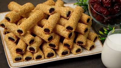  طرز تهیه چوب کنجد با خرما، دسری خشمزه و مقوی