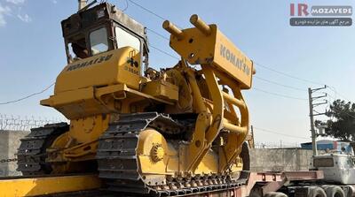  مزایده ماشین آلات شرکت سهامی خاص فروش تعدادی محدود (سایدبوم کوماتسو، غلطک و ...)